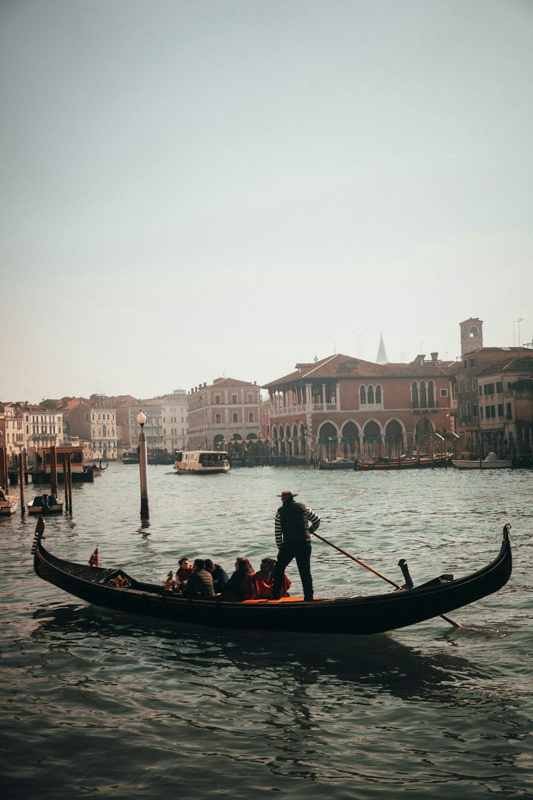 people in gondola boat at Italy